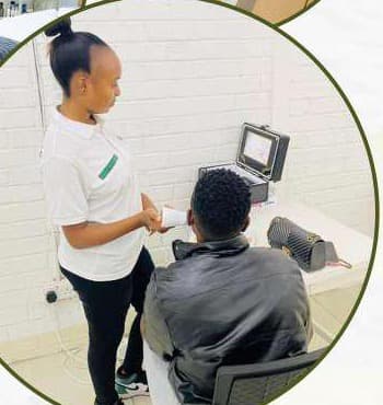 A Skincare Skinshare trainee performing a skin analysis on a client