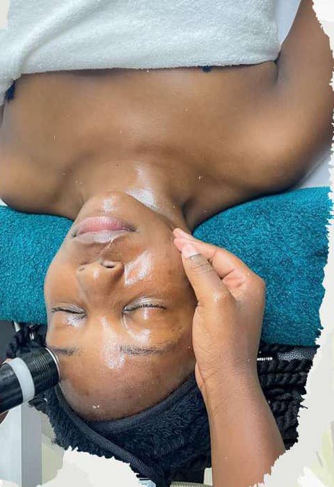 A client receiving a facial treatment at Skincare Skinshare