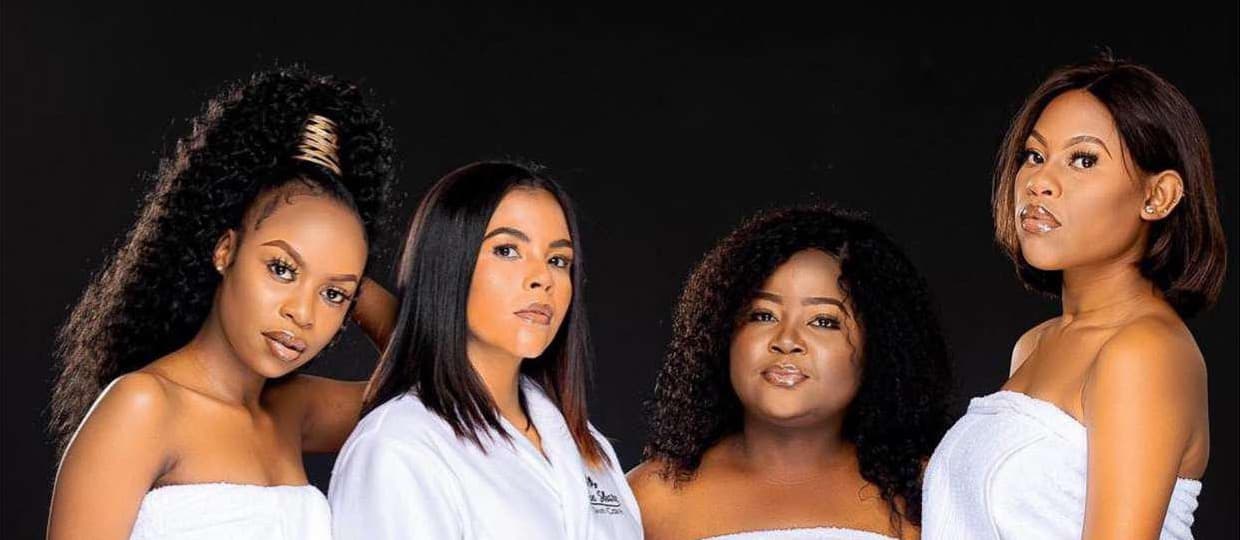 Four Skincare Skinshare team members in white towels and robes